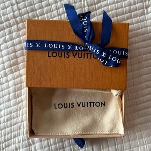 Louis Vuitton empty jewelry and accessory box. Includes dust bag, and ribbon